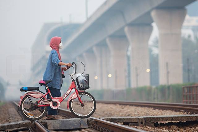 มลพิษฝุ่นเมือง: การพัฒนาพร่องการจัดการ